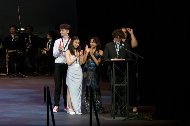 An award being presented at the podium